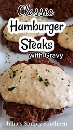 some hamburger steaks with gravy on a white plate and the words classic hamburger steaks with gravy