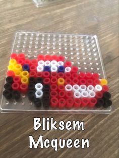 a plastic tray with some legos on it and the words bliksem mcqueen