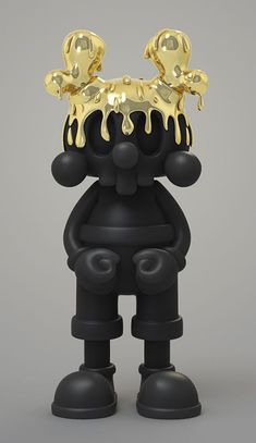 a black and gold cartoon character with two golden skulls on his head, standing in front of a gray background