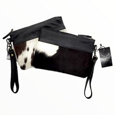 Handcrafted, Functional and Stunning. This eye catching wristlet clutch is meant for that perfect night out on the town. The beautiful genuine cowhide plus our top grain leather stands out in a crowd and is sure to be a show stopper. This wristlet is just the right size to become your go to favorite to complete that perfect outfit. From day to night this bag is perfect! Please note as cowhide is a natural material each bag is one of a kind and the pattern will differ on each Duffel Weekender. Ju Leather Stand, Perfect Night, Saddle Brown, Wristlet Clutch, Top Grain Leather, Natural Material, Perfect Outfit, Clutch Bag, Night Out