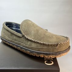 Keep It Cozy In The Denali Moccasin From Crown Vintage. The Leather Construction Provides A Lasting Add To The Cozy Wardrobe, While The Cushioned Footbed And Toasty Lining Ensure Comfort. Features Nubuck Leather Upper Slip-On Round Moc Toe Fabric Lining Cushioned Footbed Synthetic Treaded Sole Imported Casual Suede Outdoor Slippers, Casual Outdoor Suede Slippers, Casual Suede Slippers With Textured Sole, Casual Suede Slippers For Fall, Casual Suede Slippers With Leather Sole, Casual Suede Slip-on Slippers, Casual Slip-on Slippers With Suede Lining, Casual Slip-on Suede Slippers, Casual Flat Suede Slippers