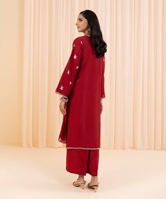 2-Piece Flared Angrakha with TrousersMake a fashionable statement in red flared angrakha featuring intricate embroidery and silk culottes. Details:Plain Front With Embroidery, Plain Back, Full Embroidered Sleeves, Y NecklineColour: RedFabric: Silk Cotton Net CulottesColour: RedFabric: Viscose Raw Silk Red Chanderi Palazzo Set With Dabka Detail, Festive Long Sets With Resham Embroidery, Unstitched Long Palazzo Set With Resham Embroidery, Traditional Red Palazzo Set With Dabka, Red Unstitched Suit With Dabka Embroidery, Festive Anarkali Embroidered Pant Set, Embroidered Long Palazzo Set For Eid, Red Embroidered Palazzo Set With Straight Kurta, Festive Designer Long Palazzo Set