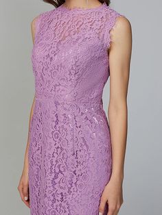 a woman in a purple lace dress