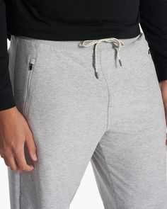 An immediate favorite, these soft-to-the-touch sweatpants are made with our partly recycled performance stretch knit. They have a relaxed fit and signature drawcord for comfort from the couch to cross-training. | Vuori Channel Pants | Light Heather Grey | Large Vuori makes premium performance apparel inspired by the active Coastal California lifestyle; an integration of fitness, surf, sport, and art. Breaking down the boundaries of traditional activewear, we are a new perspective on performance Coastal California, Grey Sweats, California Lifestyle, Grey Sweatpants, Performance Outfit, Skirt Leggings, New Perspective, Cross Training, Hoodie Top