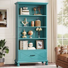 a blue bookcase in a living room