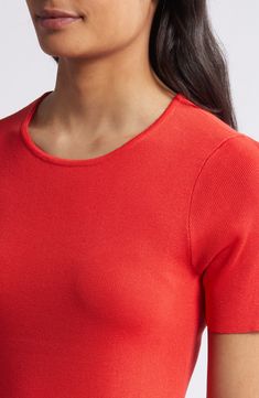 This lightweight, fine-gauge sweater provides a pop of color to perk up your everyday look. Jewel neck Short sleeves 72% rayon, 28% polyester Dry clean Imported Red Fine Knit Tops For Spring, Fitted Crew Neck Sweater For Spring, Classic Short Sleeve Solid Color Sweater, Red Fitted Fine Knit Top, Go-dry Fitted Short Sleeve Activewear, Red Fine Knit Fitted Top, Stretch Modal Short Sleeve T-shirt, Orange Relaxed Fit Crew Neck T-shirt, Orange Relaxed Fit Short Sleeve T-shirt