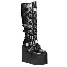 PRICES MAY VARY. ❤[ Measurement]: Heel height approx 4.72"/12CM;Platform height approx 2.36"/6cm; Shaft Height:approx 13.78"/35cm;Shaft Girth:approx14.96"/38cm ❤[ Materials ]: Upper: Faux leather; Lining: soft synthetic materials ; Outsole: anti-skid Rubber Sole Platform: black EVA Buckle: Sliver metal ❤[Punk Goth Design]: Chunky wedge heel combat boots Round toe, Buckle Design, Compact Style, Chunky Platform, Back Zipper,Metal Decoration,Knee Hight Boots ❤[Easy To Wear ]: Back Zip closure along Fake Demonia Boots, Demonia Wedge Boots, Demonia Camel 311 Boots, Knee High Platform Boots, Gothic Boots, Vegan Leather Boots, Metal Plates, High Wedges, High Heel Wedges