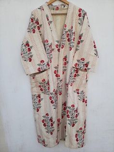 This Kimono is made of hand Kantha stitch fabric in patchwork .The fabric is a handmade printed fabric.Kantha stitch over the fabric gives it a unique look.It is two Layer of Cotton Kantha Stitch (Hand Quilted) Fabric Robe Size : Free sizeLength: 50 Inch ( 125 Cms.). Kimono Dressing Gown, Kantha Jacket, Stitch Fabric, Printed Robe, Cotton Kimono, Floral Cardigan, Quilted Fabric, Kantha Stitch, Long Kimono