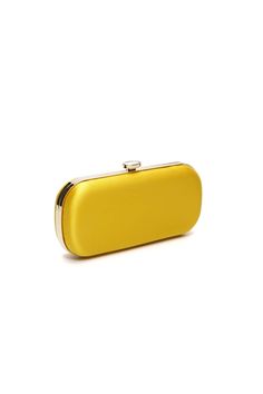 The Limoncello Yellow Bella Clutch is a bold yellow bridal handbag, crafted with duchess satin by Italian artisans featuring a lively pop of color. Size Petite: 8" x 4" x 2" Details: Italian Duchess Satin, hardshell metal frame, fabric interior with pocket, top clasp closure Planning a maximalist wedding day or looking to make a powerful statement at your next gala? Inspired by Italy’s Amalfi Coast, a coastline featuring terraced vineyards and cliffside lemon groves, this luxury handbag will mak Chic Yellow Clutch For Gift, Chic Yellow Clutch As Gift, Chic Yellow Clutch For Formal Occasions, Chic Yellow Clutch As A Gift, Elegant Yellow Bags For Formal Occasions, Elegant Yellow Bag For Formal Occasions, Elegant Yellow Formal Bags, Elegant Yellow Formal Bag, Chic Yellow Rectangular Clutch