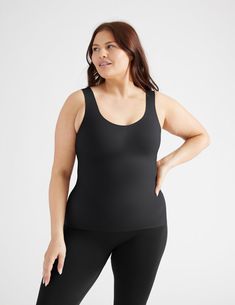 Going braless has never felt better. Now with a higher cut scoop neck, perfect for when you want more chest coverage. Featuring the wireless, built-in support and luxurious feel of our LuxeLift Technology. Find your new favorite wardrobe essential with support for cup sizes A to G. | Knix LuxeLift Scoop Neck Tank Top in Black Scoop Neck Shapewear With Built-in Bra, Shapewear Tank Top With Built-in Bra And Wide Straps, Seamless Medium Support Scoop Neck Tank Top, Seamless Scoop Neck Tank Top With Medium Support, Shaping Shapewear With Built-in Bra And Scoop Neck, Shaping Scoop Neck Shapewear With Built-in Bra, Black Tank Top With Built-in Bra And Scoop Back, Supportive Seamless Scoop Neck Tank Top, Seamless Shaping Scoop Neck Shapewear