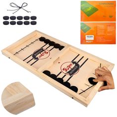 two pieces of wood with black and white game pieces in front of the image, including an egg - friendly solid wood board