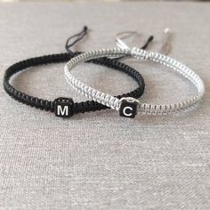 "Add to cart and write in the note to seller initials you need. You will receive: -Two adjustable knotted bracelets in the colors of your choice, -Organza bag, ready for gift giving! Materials: - Highest quality nylon cord and . Choose the bracelet color from the drop-down menu. Size: - Woman size adjustable approx. from 7\" up to 11\". - Man size adjustable approx. from 7,5\" up to 12\". - My sizes will fit most people, but if you are unsure and require bracelets for particularly large or small Personalized Silver Braided Bracelet Minimalist Style, Personalized Silver Braided Minimalist Bracelet, Minimalist Adjustable Bracelets For Birthday, Minimalist Adjustable Bracelet For Birthday, Handmade Silver Friendship Bracelets For Birthday, Adjustable Letter-shaped Friendship Bracelets, Customizable Letter Bracelets For Friendship, Adjustable Black Jewelry With Initials, Personalized Silver Braided Bracelets For Friendship