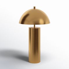 an image of a gold lamp that is on the floor in front of a white background