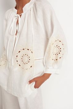 ✨ PRE ORDER: Ships by June 31, 2023 Get a boho look this season with the Leros blouse. Made from 100% linen, this lightweight shirt features a beautiful embroidered daisy details, and a feminine finishing touch. 100% Linen Hand wash Embroidery: 100% Polyester Handmade in Greece GREEK ARCHAIC KORI Elegant Summer Tops With Cutwork Hem, Chic Spring Tops With Cutwork Hem, White Feminine Top With Cutwork Hem, Casual Embroidered Linen Blouse, Long Sleeve Linen Top With Floral Embroidery, Chic Long Sleeve Tops With Cutwork Hem, White Summer Blouse With Cutwork Hem, White Cutwork Hem Summer Blouse, Chic Floral Embroidered Relaxed Fit Blouse