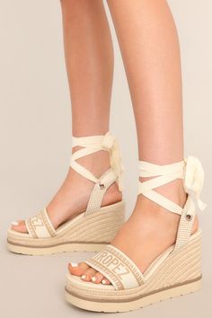 These tan espadrille platform sandals feature a rounded toe, a strap over the top of the foot and around the heel, adjustable self-tie straps around the ankle, and a wedged heel. Trendy Wedges, Tan Espadrilles, Corporate Chic, Sorority Rush Dresses, Espadrilles Platform, Red Dress Boutique, Dress Bra, Friend Outfits, Little White Dresses