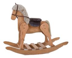 a wooden rocking horse with a black seat on it's back and white mane