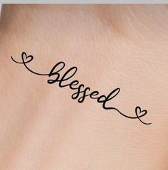 a woman's arm with the word bleed written in cursive writing on it