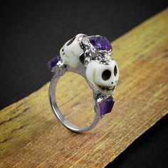 GemFormingStudio D E T A I L S Natural Purple Amethyst Skull Horror Handmade Multi-Stone Rough Gemstone Statement Ring for her , Engagement Ring Stone MM : 5 X 4 MM ( Approx ) Ring Size : (See all the variations) Weight : 3.88 gm Color : Multi Color Shape : Skull Shape Material : Copper Polish : All Polish Available Listing link for tourmaline skull earring : - https://www.etsy.com/listing/992470093/tourmaline-stud-earring-skull-stud?ga_search_query=skull&ref=shop_items_search_2&pro=1&am Anniversary Spiritual Skull Ring, Skull Shaped Ring As Halloween Gift, Collectible Halloween Skull Ring, Collectible Skull Rings For Halloween, Collectible Skull Ring For Halloween, Unique Sterling Silver Halloween Rings, Unique Sterling Silver Rings For Halloween, Skull Halloween Promise Ring, Unique Skull Shaped Anniversary Rings