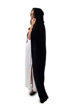 This full length Black Velvet Adult Cloak is perfect for a variety of dress up occasions; wear to any Halloween Party, Cosplay, Role Playing, Gothic, Steampunk, Renaissance, Medieval Events or a Masquerade Ball! Made from black velvet, measuring from 60.5" from neckline to hem Satin trimmed hood with ribbon tie closure Machine washable and made for repeat use Breathable, 100% Polyester Fabrics Costumes & accessories not included Black Cosplay Costume For Costume Party In Fall, Fitted Black Cosplay Costume For Fall, Black Gothic Cosplay Costume, Black Gothic Cosplay Costume For Costume Party, Gothic Black Costume For Party, Gothic Black Cosplay Costume, Gothic Cape For Costume Party In Fall, Witchy Black Costume For Halloween, Black Cosplay Costume For Halloween