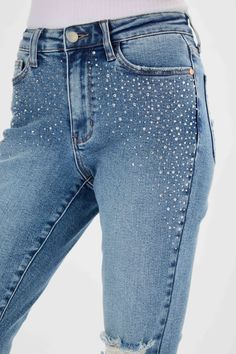 Judy Blue High Waist Rhinestone Embellished W/ Destroyed Slim Denim 88565 Slim fit: cut to a wider leg opening compared to skinny Material: 94% Cotton, 5% Polyester, 1% SpandexFront Rise: 10 3/4"Inseam: 28 1/2"Model Info:Size: 1Height: 5'9Waist: 24"Hip: 34" Measured on the smallest size and may vary by size. Sizing Recommendation: We recommend sizing down one from your normal non-Judy Blue jean size. Contact us for any additional measurements or sizing. Front rise determines how high your pants Embellished Jeans Rhinestone, Diy Rhinestone Jeans, Jeans With Diamonds, Diamonds Jeans, Bejeweled Jeans, Sparkly Jeans, Diamond Jeans, Jeans With Rhinestones, Bedazzled Jeans