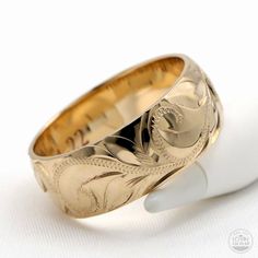 Sea turtle ring from Hawaii. Green Sea Turtle in Hawaiian tradition is a symbol of good luck in the form of a guardian spirit, or Amakua in Hawaiian. Handmade with solid 14K gold. Ring width is 8mm. Lovin' Hawaii Jewelry Features Made to Order. Handmade in Hawaii. Hand engraved design. Gold Karat: 14 Karat Available Gold Color: Rose Gold / Yellow Gold / White Gold Ready to Ship in 5 Business Days from HAWAII. Free inside message engraving. To make the piece more personal, you can add a special m Traditional Engraved Yellow Gold Ring, Engraved Wide Band Yellow Gold Rings, Heirloom Yellow Gold Engraved Ring For Ceremonial Occasions, Engraved Wide Band Heirloom Jewelry, Classic Carved Yellow Gold Jewelry, Heirloom Wide Band Engraved Jewelry, Heirloom Ceremonial Yellow Gold Engraved Ring, Traditional Carved Engraved Wedding Ring, Ceremonial Yellow Gold Carved Engraved Ring