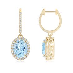 Glimmering diamonds encircle the aquamarines, accentuating their mesmerizing sea blue hue. Designed in 14K yellow gold, the oval aquamarine earrings come with hinged clip closures and exhibit an elegant drop look. They are embellished with additional sparkling diamond accents on the hoop. The intricate scrollwork offers a splendid sight from the sides. Aquamarine Earrings, Halo Earrings, Sparkling Diamond, Sea Blue, Diamond Halo, Sparkle Diamonds, Modern Jewelry, Halo Diamond, Aquamarine