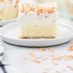 two pieces of cake sitting on top of a white plate