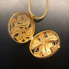 Inspired by Yun Boutique logo, this Auspicious Flower pendant embraced ancient Chinese filigree jinlay art with classic modern elegance. Adjustable chain can be styled with difference collar shapes. Not to be confused with regular gold plating, our vermeil is a thick layer of 18k solid gold on sterling silver. Chinese filigree inlay art is a delicate kind of jewelry metalwork, usually of twisted threads made of gold, silver, and copper, soldered together and arranged in artistic motifs with moun Filigree Pendant Necklace, Metalwork Jewelry, Filigree Pendant, Boutique Logo, Ancient Chinese, Golden Globes, Deep Green, Boutique Jewelry, Gold Pendant Necklace