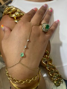 Made with solid 14K yellow gold, and natural Colombian emerald and diamonds. One size fits most, please inquire with you middle finger ring size and wrist side to confirm.  Custom adjustments provided Finger Wrist Bracelet, Finger To Wrist Bracelet, Chain Ring Bracelet, Gold Hand Chain, Maximalist Jewelry, Finger Bracelets, Middle Finger Ring, Hand Chain Bracelet, Personal Closet