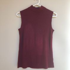 Sleeveless Turtleneck New (Never Worn); 212 Collection; Size Small; Burgundy Size: Small Pit To Pit: 16 Inches Shoulder To Hem: 24 Inches 100% Acrylic Orders Are Shipped Within 24 Hours Of Sale Confirmation (Excluding Sundays). Red Sleeveless Top For Fall, Burgundy Sleeveless Summer Top, Summer Burgundy Sleeveless Top, Red Sleeveless Sweater Vest For Summer, Red Fitted Sleeveless Sweater Vest, Fitted Red Sleeveless Sweater Vest, Red Fitted Sweater Vest, Maroon Tank Top, Sleeveless Turtleneck