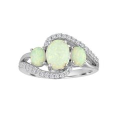 Wear this luminescent sterling silver opal three-stone ring as a gorgeous statement piece or to symbolize your past, present and fabulous future. Size: 7.  Gender: female.  Age Group: adult. Diamond White Jewelry With Side Stones As Gift, Diamond Ring With Side Stones For Anniversary, White Jewelry With Side Stones As A Gift, White Jewelry With Side Stones For Gift, Three Stone White Promise Ring, White Three Stone Jewelry For Promise Ring, Dazzling Three Stone Diamond Ring Gift, Anniversary Rings With Side Stones, Dazzling Three Stone Rings For Gifts