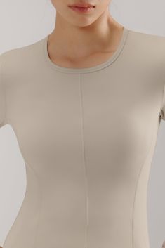 Meet our Mousse Long Sleeve Sports Top, a sleek active shirt designed to help you move to your own rhythm. A slim fit cut and middle-seam detail add a touch of informal elegance to this piece, making it ideal for mixing & matching with your favorite leggings and bottoms for any gym-to-street look! Fit tip: if you're in between sizes, we recommend sizing up. Details Materials & Care Shipping & Returns • High neckline with long sleeves and a thumbhole design for optimal flexibility while staying s Long Sleeve Sports Top, Favorite Leggings, Long Sleeve Workout, Everyday Elegance, Simply Chic, Street Look, Sports Top, High Neckline, Workout Tops