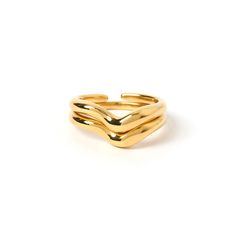 Our gorgeous golden Simi Ring is designed to overlap or stack. This piece is versatile and is therefore perfect for any and every look. The two perfectly tessellating shapes come together to form the perfect match, taking your ring stack to the next level!  14k Gold Plated (1 micron plating) Stainless Steel Base E-coating for a premium finish Lead & Nickel Free Tarnish and Water Resistant CARING FOR YOUR AOE JEWELS  At Arms Of Eve, we take great pride in the quality of all our jewels. All of our Gold Double Band Stackable Rings With Modern Twist, Gold Stackable Rings With Modern Twist, Modern Twist Gold Stackable Rings With Open Band, Gold Stackable Rings With Open Band In Modern Style, Gold Stackable Rings With Open Band And Modern Twist, Modern Gold Double Band Stackable Rings, Modern Twist Gold Stackable Rings, Dad Jewelry, June Birthstone Jewelry