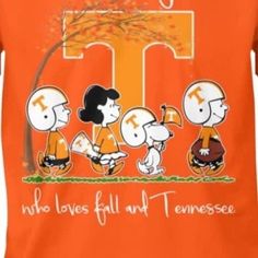 an orange t - shirt with the letter tennessee on it and three cartoon characters in front