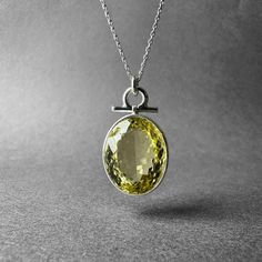 Stunning Lemon Quartz Silver Necklace - Yellow Lemon Quartz Jewelry - Completely Handmade & Silver Gemstone: Natural Lemon Quartz Metal: Pure 925 Sterling Silver Stone Cut: Faced Stone Size : 21.0 mm x 17.6 mm - 0.82 in x 0.69 in Pendant Size: 33.1 mm x 18.3 mm - 1.30 in x  0.72 in Weight: 8.77 gram (43.85 carats) total weight of stone and silver.  For ring orders, ring resizing is free.  Chains are gifts for necklace orders. Note: We don't use any filters for photos. The details may not be clear. Feel free to contact us with any questions, special orders or additional photo or video requests. We will be happy to provide more information! :) WORLDWIDE FedEx, UPS or TNT EXPRESS MAIL SERVICE (Delivery time: 1 - 5 business days.) LAYAWAY PAYMENT PLAN is available. Lemon Quartz: The Healing Ge Yellow Spiritual Round Jewelry, Classic Citrine Pendant Jewelry, Yellow Oval Sterling Silver Necklace, Yellow Spiritual Jewelry For Anniversary, Large Stone Citrine Jewelry For Anniversary, Citrine Jewelry With Large Stone For Anniversary, Yellow Sterling Silver Necklace With Round Pendant, Yellow Sterling Silver Round Pendant Necklace, Sterling Silver Necklace With Large Stone For Anniversary