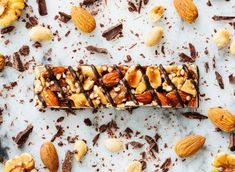 a chocolate bar with nuts and almonds on top