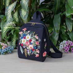 Hello! Welcome to my store! Wish you have a satisfying purchase！ When you have to think of a beautiful, meaningful, impressive gift for your lover, mother or friends then this will be the perfect choice for you! ⭐Don't hesitate to contact us if you have any questions! Thank you *Embroidered handbag ⭐The Backpack is handmade, each stage is meticulously cared for by skilled craftsmen. ⭐The Backpack is embroidered with very prominent, strange and beautiful ribbons. ⭐The Backpack is made of canvas fabric ⭐Backpack dimensions : 12.59x9.84x6.7 in / 32x25x17 cm  ⭐Because the patterns on the product are designed and produced in limited quantities, so please contact us to have more request to own the Bag model you like best! Important: ⭐The flower color of the embroidery pattern can be changed to b School Backpack With Floral Embroidery, Casual Floral Embroidery Backpack, Casual Floral Embroidered Backpack, Travel Backpack With Floral Embroidery, Casual Embroidered Backpack For Daily Use, Black Embroidered Standard Backpack, Embroidered Rectangular Backpack, Everyday Backpack With Custom Embroidery, Everyday Use Backpack With Custom Embroidery