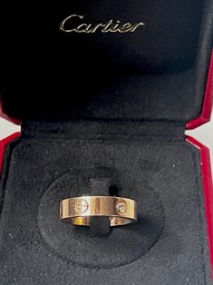 Lovely Cartier Love Ring in yellow gold and diamonds , decorated with of engraved screw patterns. Signature: Cartier and numbered (0.5 mm width).  Weight: 10.1 grams Ring US size: 9.5   Very good antique conditions. Thank you for visiting Boudoir Vintage!   Please feel free to contact me for further information or photos.  I offer international shipping. Your item will be packed with extreme care and will be shipped within 3-5 working days. If you are dissatisfied with your item, please feel free to contact me and would be happy to assist.  If you are interested in paying in installments or reserve an item, please send me an inquiry. To continue visiting my shop, please visit  https://www.etsy.com/shop/BoudoirVintageBijoux/ FOLLOW ME on Instagram: https://www.instagram.com/boudoir_vintage/ Cartier Love Ring With Engagement Ring, Arabian Wedding, Cartier Love Ring, Cartier Love, Love Ring, Vintage Cartier, Rings Statement, Cartier, Cartoon Art