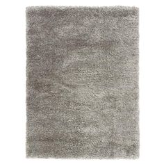 a gray rug on a white background with no one in the room to see it