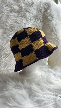 It's summertime and that means time for a nice cool bucket hat! This really fun checked bucket hat is done in a purple and yellow coloration - University of Washington Huskies colors. A very striking hat made with 100% cotton yarn that will ensure your comfort in the warm weather and protect your head from the suns hot rays. Yellow Cotton Bucket Hat With Short Brim, Trendy Purple Bucket Hat With Curved Brim, Yellow Cotton Bucket Hat With Curved Brim, Yellow Cotton Beanie Hat, Trendy Purple Bucket Hat, Summer Plaid Bucket Hat, Casual Purple Bucket Hat With Curved Brim, Yellow Brimmed Cotton Bucket Hat, Yellow Wide Brim Cotton Bucket Hat