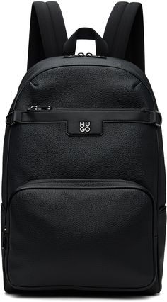 Grained faux-leather backpack in black. · Carry handle · Adjustable padded shoulder straps · Logo hardware and D-rings at face · Zip pocket · Luggage strap at padded back face · Zip compartment · Two-way zip closure · Two compartment interior · Laptop compartment at interior · Logo-woven satin lining · Logo-engraved gunmetal-tone hardware · H17 x W11 x D9 Supplier color: Black Leather Backpack With Branded Hardware For Daily Use, Modern Backpack With Gunmetal Hardware, Black Backpack With Gunmetal Hardware For Travel, Black Travel Backpack With Gunmetal Hardware, Travel Leather Backpack With Gunmetal Hardware, On-the-go Backpack With Gunmetal Hardware, Leather Backpack With Branded Hardware, Leather Backpack With Gunmetal Hardware For Daily Use, Everyday Leather Backpack With Branded Hardware