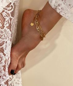 Add elegance to any look with our golden Evil Eye stainless steel anklet, featuring an adjustable double chain design by ToughCandy--perfect for a unique birthday gift. Welcome! 🍭 📌Please Kindly Note: The listing is for only one anklet! 📌The paperclip chain is made of stainless steel and has been immersed in 18K Gold twice!  📌The evil eye chain is made of stainless steel and enamel. 📌It is subjected to an anti-allergic process (lead & nickel free). 📌It is lightweight, easy to wear! 📏MEASUREMENTS: 👉Chain Extention Length: 1.96" (5cm) 👉Paperclip Chain Width: 0.15" (0,4cm) 👉Evil Eye Chain Width: 0.31" (0,8cm) * Matching Necklace: https://toughcandy.etsy.com/listing/1740127269 📌MADE TO ORDER! All jewelry can be adjusted to any size and custom-made for you! There are no returns on an Elegant Anklet, Double Chain Bracelet, Candy Jewelry, Unique Birthday Gift, Unique Birthday, Chain Design, Unique Birthday Gifts, Double Chain, Anklet Bracelet