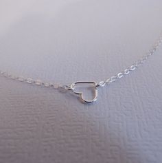 Tiny Sterling Floating Heart Necklace Silver Heart by West9th, $15.00 Minimalist Silver Heart Jewelry, Simple Silver Heart Necklace For Valentine's Day, Minimalist Silver Heart Necklace For Mother's Day, Simple Silver Heart Pendant Necklace, Minimalist Silver Heart Necklace For Gift, Simple Silver Heart Necklace As Gift, Silver Simple Heart Necklace For Gift, Silver Minimalist Double Heart Necklace, Silver Heart Necklace For Everyday