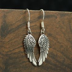 Silver Angel Wing Earring - Angel Wing Dangle Earring - 925 Sterling Silver Earring - Handmade Earring - Ear Wire Earring - Angel Wing Jewelry - Unique Silver Jewelry - Antique Silver Earring - Feather Earring - Gift For Her - Best Gift Jewelry. We accept customisation, contact us For Custom orders. Product Detail : Metal : 925 Sterling Silver Christmas Day Offer-Christmas Sale-Father's Day Gift-Mother's Day Gift-Christmas Gift-Wedding Jewelry-Birthstone Jewelry-Bridal Jewelry-Personalized Jewel Wing-shaped Earrings For Gift, Wing-shaped Pierced Earrings As Gift, Wing-shaped Pierced Earrings For Gift, Handmade Silver Wing-shaped Earrings, Silver Wing-shaped Earrings, Elegant Nickel-free Wing-shaped Jewelry, Handmade Silver Earrings, Angel Wings Jewelry, Sterling Silver Earrings Handmade