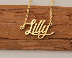 "Name Necklace, Custom Initial Necklace, Name Necklace Gold, Couples Necklace, Personalized Christmas Gift Necklace for Lilly This necklace is made of Stainless Steel Available color: Gold, Silver and Rose Gold Chain Length: 14\"16\"18\"20\"22\" inches Processing Time: 2-10 business days Standard Shipping: 10-15 business days to USA. 15-30 business days to other countries. Expedited Shipping: 5-8 business days to USA. 5-10 business days to others. Please do not hesitate to contact us with any co Lilly Necklace, Sims Names, Graduation Gifts For Friends, Couples Necklace, Birthday Necklace Gift, Name Necklace Gold, Custom Initial Necklace, Necklace Name, Friendship Necklaces