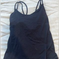 Questions? Leave A Comment Below! Never Worn, Unfortunately Bought The Wrong Size Not Returnable As I Cut Off Tags Black Bra-friendly Tank Top For Light Exercise, Black Tank Top For Light Exercise, Black Tank Strap Sporty Top, Black Athleisure Tops With Built-in Bra, Sporty Black Top With Tank Straps, Black Workout Top With Seamless Construction, Black Seamless Tops For Pilates, Sporty Black Tank Top, Seamless Black Tops For Pilates