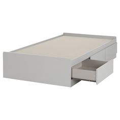 an open drawer on the side of a bed