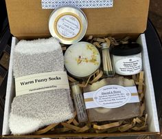 Almond & Honey bath gift set, thank you gift set, birthday gift set, bath and body set, holiday, birthday or thank you gift set. The set includes 1 Bar of Almond & Honey  goats milk soap, 4.0 oz 1 jar of Almond & Honey lotion (2.2 oz) 1 pair of adult socks 1 Chapstick (Buttercream) 1 glass tube of matches  1 candle 3 oz vanilla birch Nicely packaged in a gift box with a ribbon around it.  This is a great gift set with nice size products included made with natural ingredients. If you would like a note attached, please send me an email. Disclaimer:  This shop and its owner is not responsible for allergic reactions to soap or any of my handmade body products. All ingredients are of high quality with no harsh detergents and are listed in the product description, please read carefully, if you h Honey Gift, Honey Gifts, Bath Gift Set, Socks Gift, Relax Spa, Client Gifts, Spa Kit, Milk Soap, Sock Gifts