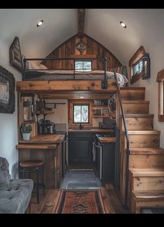 the interior of a tiny house with stairs