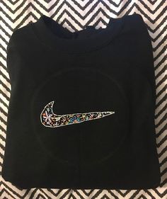 Black hand embroidered sweater Black Embroidered Long Sleeve Sweater, Black Long Sleeve Embroidered Sweater, Fall Floral Embroidered Crew Neck Sweater, Black Cotton Sweater With Embroidered Logo, Winter Black Embroidered Tops, Black Crew Neck Sweater For Spring, Black Crew Neck Sweater With Embroidered Logo, Black Long Sleeve Sweater With Embroidered Logo, Black Tops With Embroidered Logo For Spring